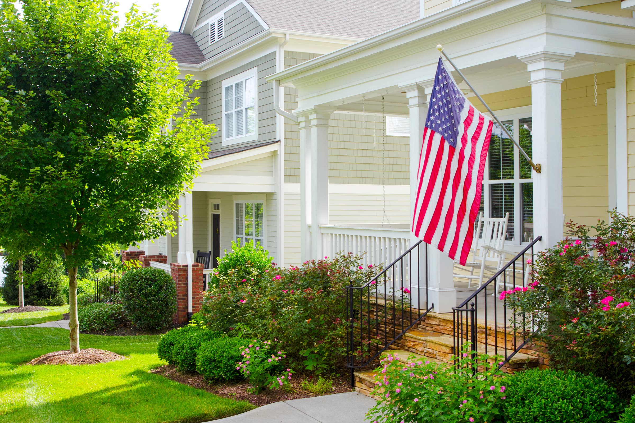 Home exterior with an American flag